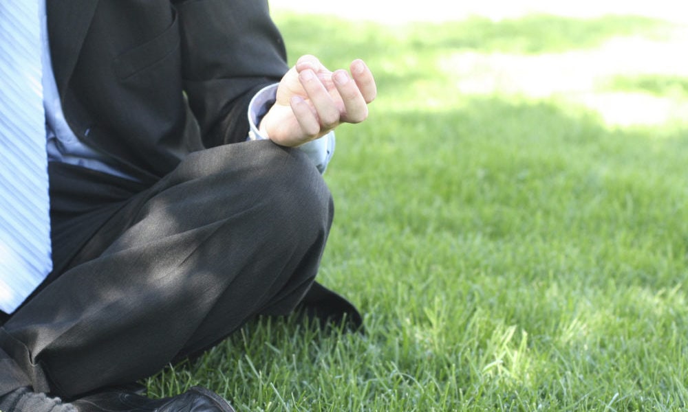 Businessman meditating